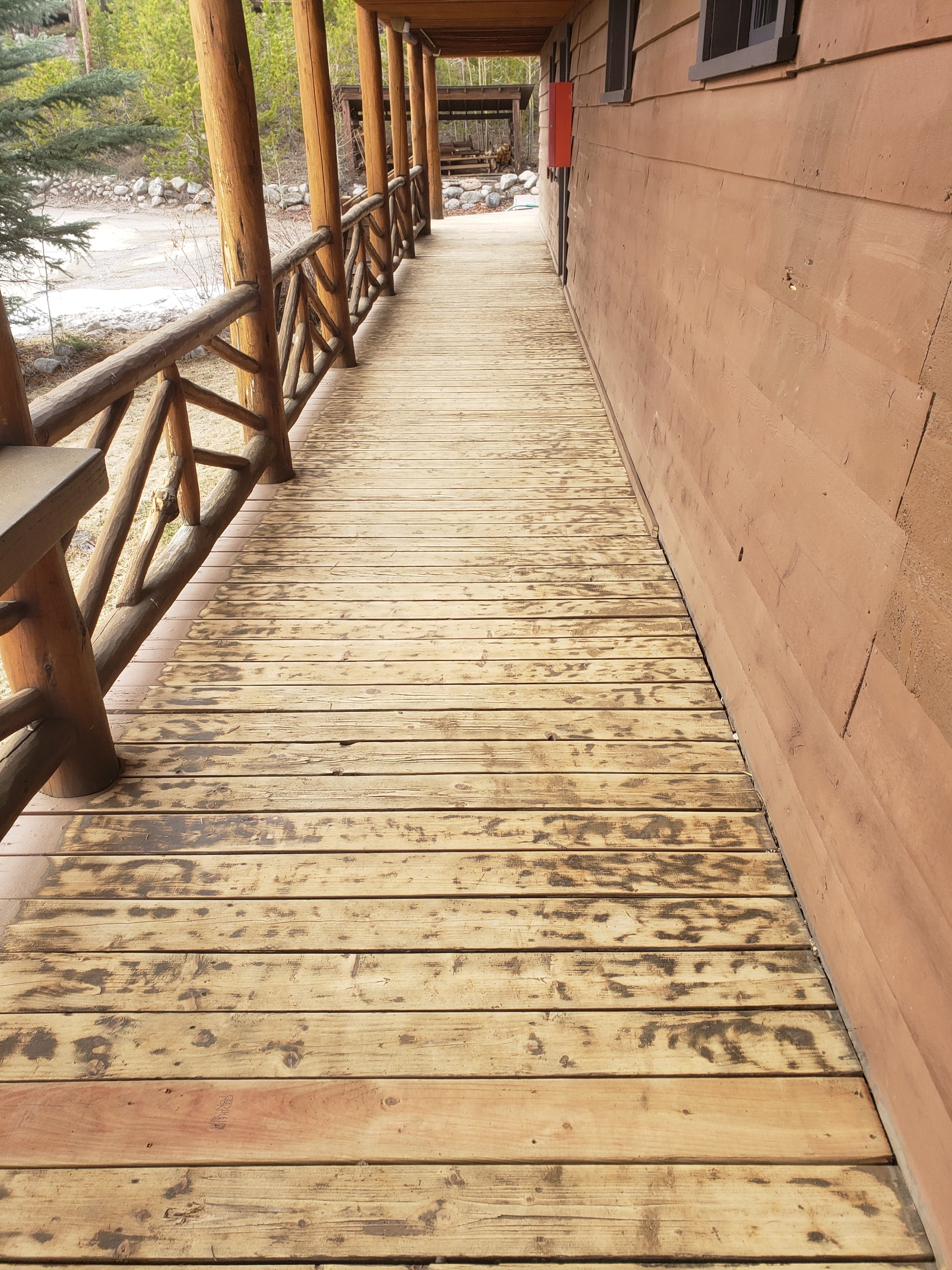 Existing walkway before boardwalk and stair improvements at a mountain property