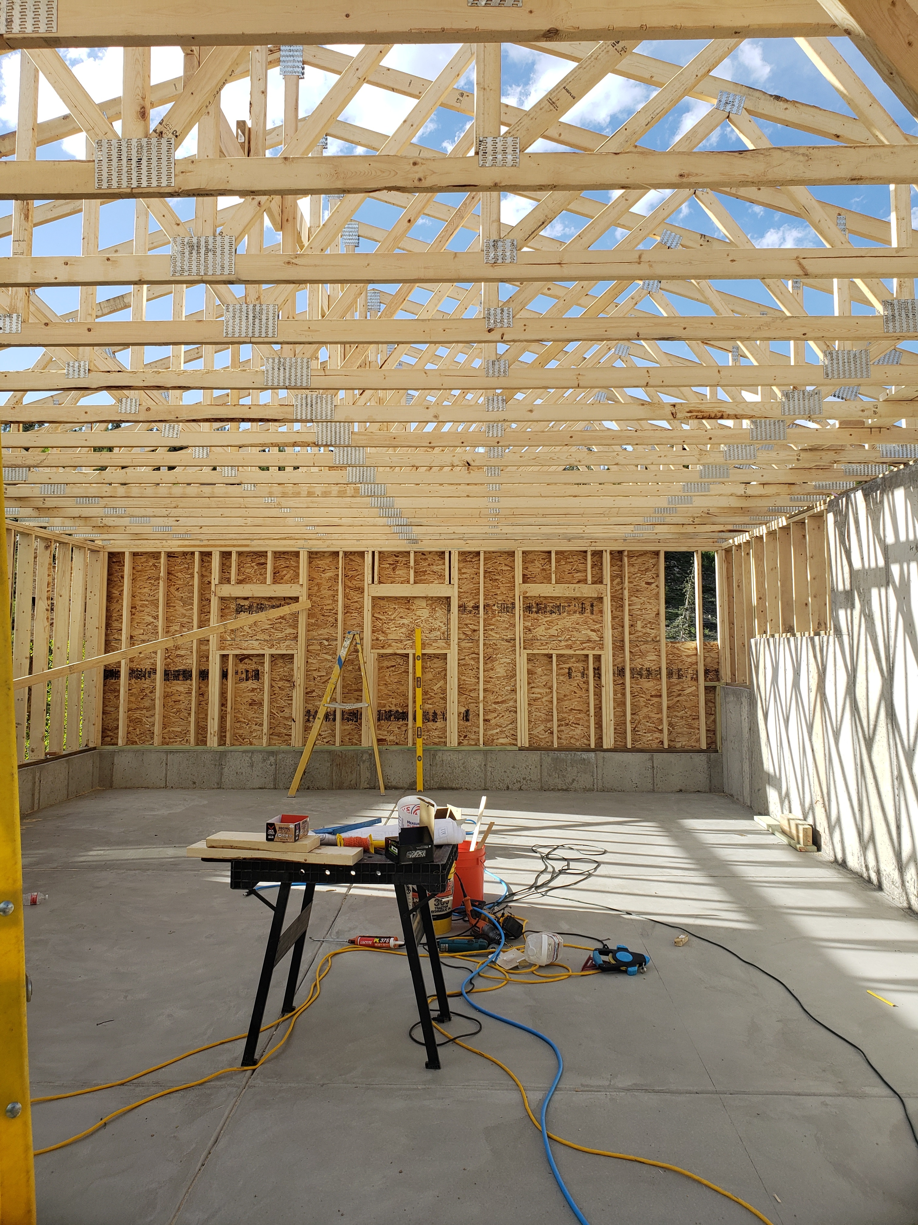 Interior framing and active construction work by High Mountain Trades